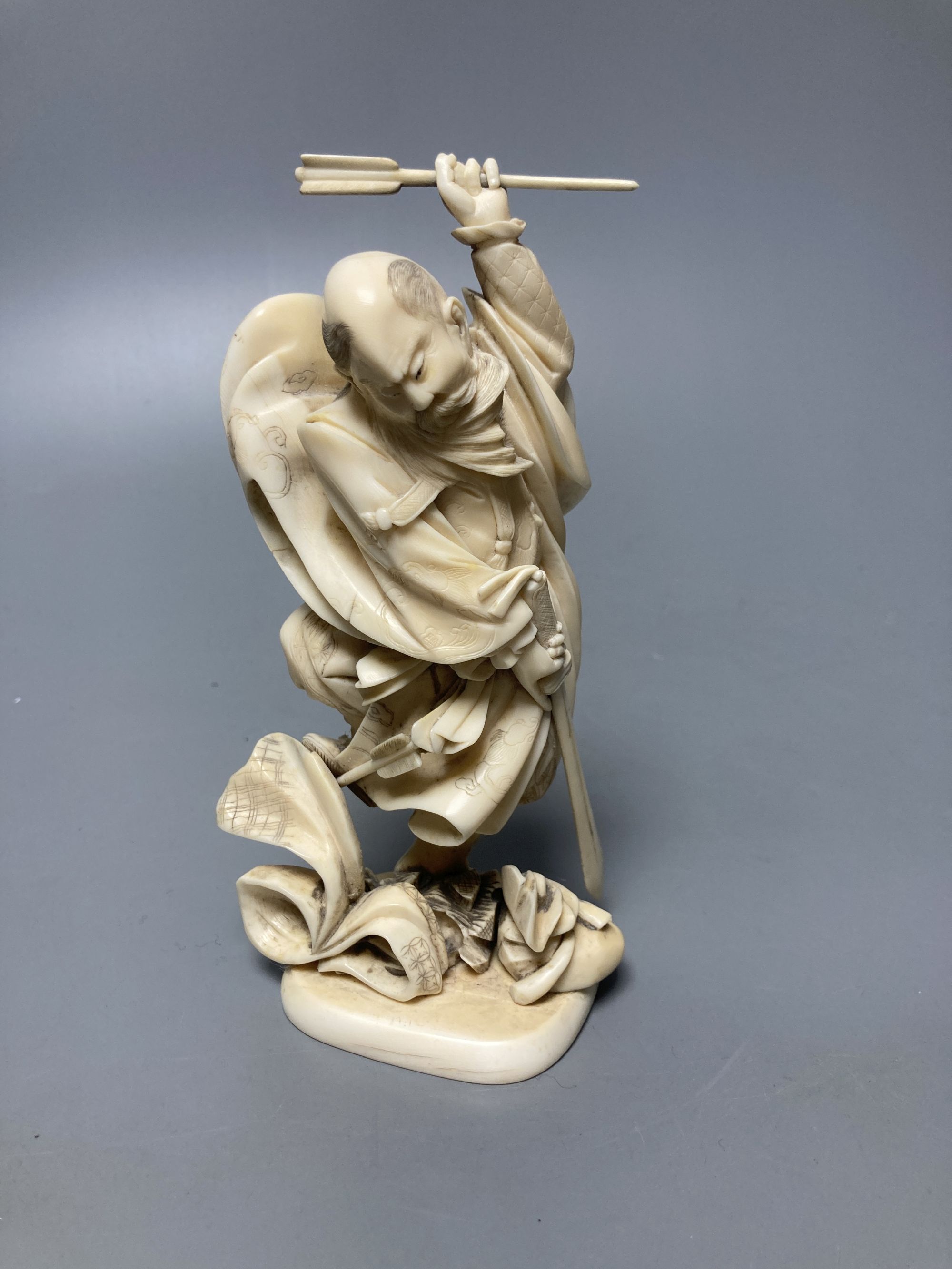 A Japanese ivory figure of a warrior, 19th century, height 16cm
